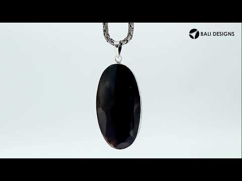 Sterling silver oval pendant with Abalone Shell and polished scroll detailing handcrafted in Bali.