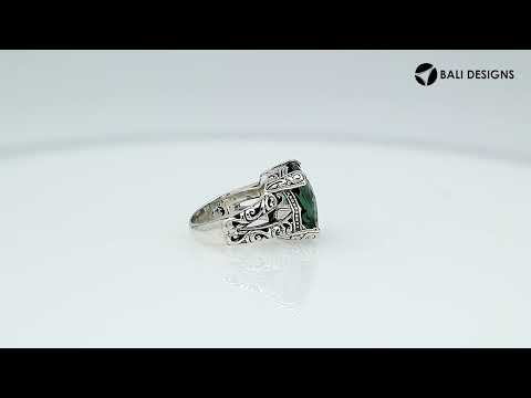 Handcrafted 925 sterling silver ring with cushion-cut green quartz, ornate Bali design.