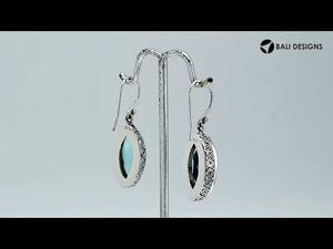 Wholesale sterling silver marquise-shaped Blue Topaz Quartz earrings with polished finish and earwire lock.