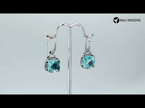 Wholesale sterling silver cushion-shaped earrings with Blue Topaz Quartz and Cubic Zirconia accents.