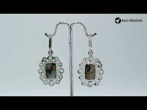 Wholesale sterling silver earrings with Labradorite center and Blue Topaz Quartz cluster accents.