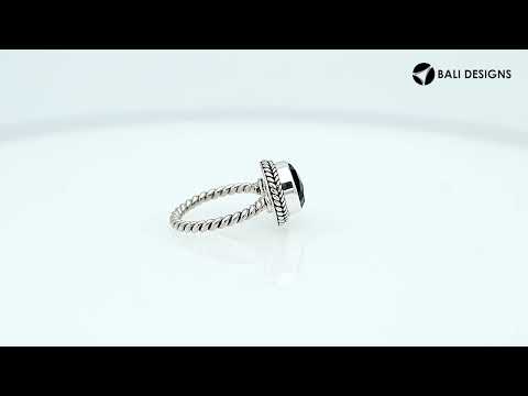 Sterling silver ring with a round Green Quartz and rope-style band design.