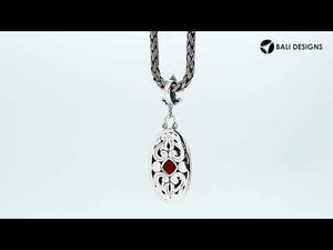Sterling Silver Ornate Oval Pendant Featuring Garnet Quartz With Fleur-De-Lis Decorative Bail.