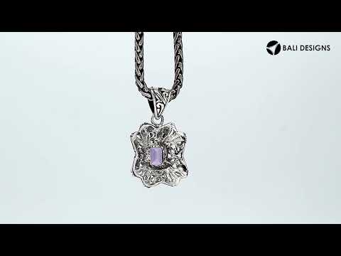 Handcrafted sterling silver rectangular pendant with Amethyst Quartz center and traditional Balinese motif design.
