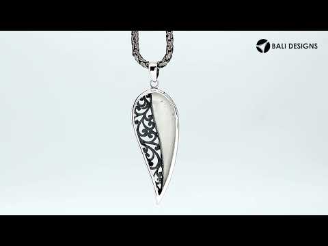 925 sterling silver long leaf pendant with mother of pearl and intricate Balinese scrollwork pattern