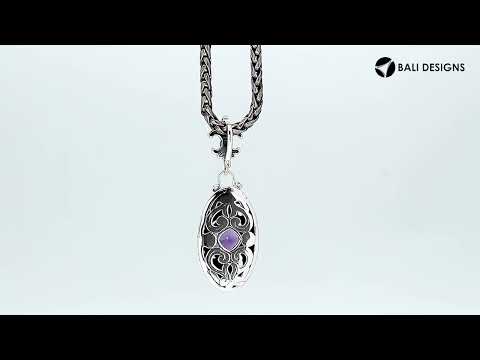 Sterling Silver Ornate Oval Pendant Featuring Blue Topaz Quartz With Fleur-De-Lis Decorative Bail.