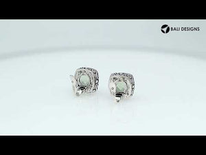 Wholesale sterling silver earrings featuring cushion-cut green amethyst quartz framed with ornate Balinese detailing, designed for consistent artisan quality and strong catalog-ready presentation within wholesale jewelry collections.