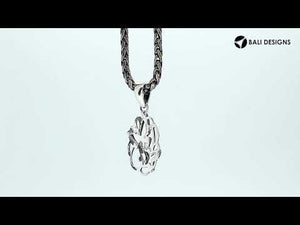 Sterling silver butterfly pendant with polished openwork design and classic craftsmanship.