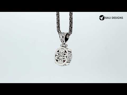 Sterling Silver Pendant With Round Mabe Pearl And Balinese Ornamental Design.