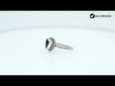 Sterling silver trillion Blue Topaz Quartz ring with faceted Blue Quartz and rope bezel, wholesale jewelry from Indonesia.