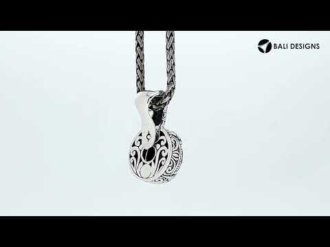 Sterling silver cushion pendant featuring faceted Sapphire Quartz in a Balinese engraved artisan frame.