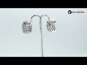 Wholesale sterling silver London Blue Topaz Quartz cushion stud earrings with polished finish and push-back lock.