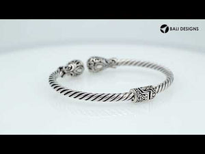 Sterling silver twisted bangle with ornate Balinese end design and oxidized finish