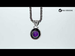 Wholesale sterling silver pendant with round Amethyst Quartz and ornate Balinese bail.
