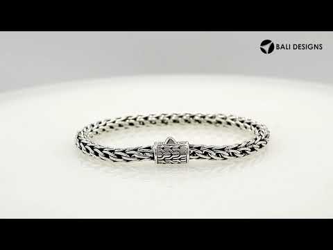 Wholesale sterling silver bracelet with a polished 5MM woven Balinese chain and a secure push clasp designed for durable and premium catalog presentation.