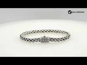 Wholesale sterling silver bracelet with a polished 5MM woven Balinese chain and a secure push clasp designed for durable and premium catalog presentation.