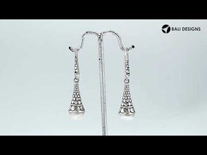 Sterling silver White Pearl textured cone drop earrings with oxidized finish and earwire lock.
