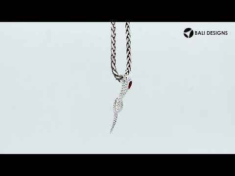 Sterling silver snake pendant with Red Coral accent and detailed scale pattern.