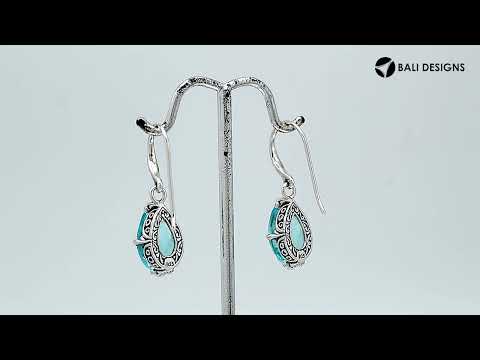 Wholesale Sterling Silver Blue Topaz Quartz Teardrop Earrings With Detailed Balinese-Style Metalwork.