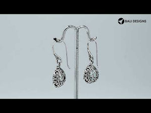Wholesale sterling silver teardrop earrings with Blue Topaz Quartz and carved side detailing.