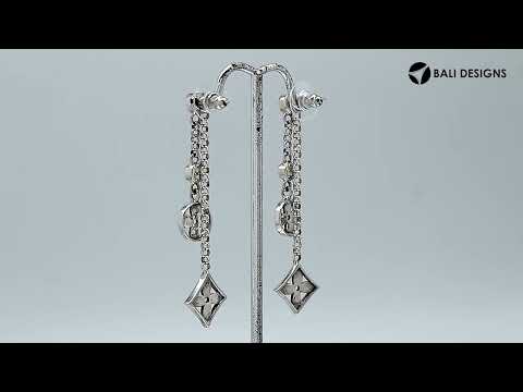 Sterling silver dangle earrings with Blue Topaz Quartz and Cubic Zirconia