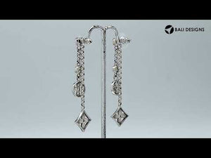 Sterling silver dangle earrings with Blue Topaz Quartz and Cubic Zirconia