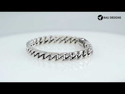 A finely crafted 925 sterling silver chain link bracelet featuring a Cubic Zirconia paved centerpiece with a polished finish and intricate interlocking chain design.