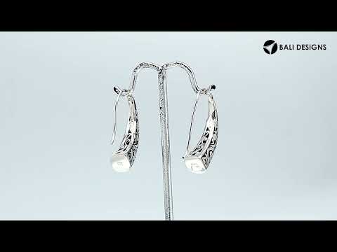 Wholesale Sterling Silver tapered curved earrings with oxidized scroll and geometric patterns.