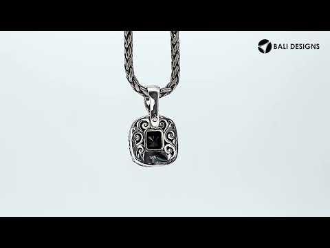 Sterling silver cushion pendant with Rainbow Moonstone and Balinese scroll detailing.