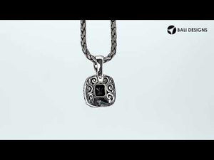 Sterling silver cushion pendant with Rainbow Moonstone and Balinese scroll detailing.