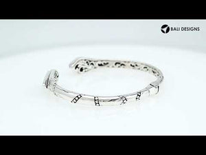 Wholesale sterling silver open bangle featuring Abalone Shell geometric ends, detailed Balinese engravings, and a secure hinge lock for premium artisan-inspired jewelry assortments.
