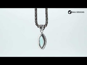 Blue Topaz Quartz marquise pendant in sterling silver with Balinese scroll detailing, wholesale handcrafted jewelry from Bali.