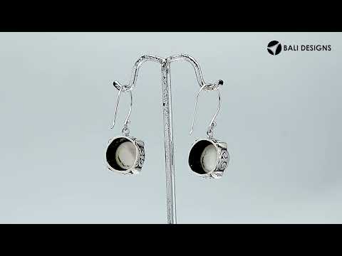 Wholesale sterling silver earrings with round white pearl and Bali-style handcrafted design.