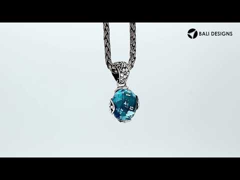 Wholesale sterling silver pendant with faceted Citrine Quartz and Balinese floral detailing, handcrafted in Bali.