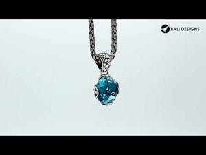 Wholesale sterling silver pendant with faceted Citrine Quartz and Balinese floral detailing, handcrafted in Bali.