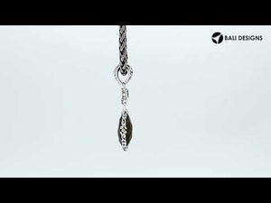 Sterling silver Blue Topaz Quartz and Rainbow Moonstone teardrop pendant.