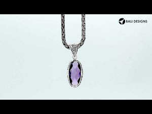 Sterling Silver oval-shaped Amethyst Quartz pendant with floral and scroll detailing
