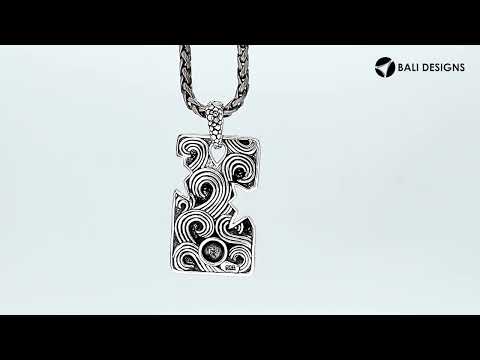 Wholesale sterling silver rectangle pendant with cracked divider and pebble texture.