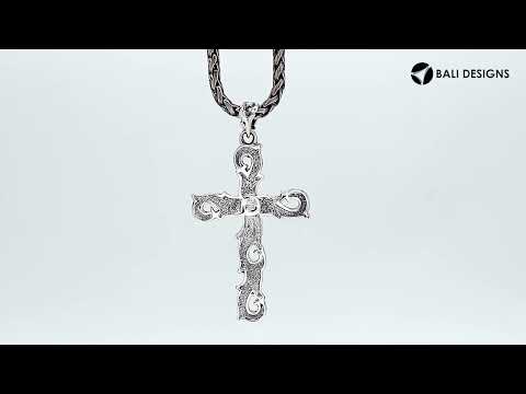 Sterling silver artistic cross pendant featuring smooth curved detailing, polished finishing, and expressive symbolic styling ideal for classic wholesale jewelry displays