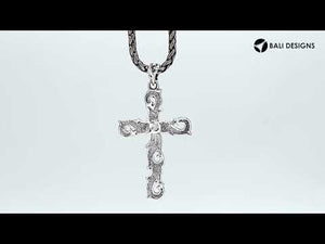 Sterling silver artistic cross pendant featuring smooth curved detailing, polished finishing, and expressive symbolic styling ideal for classic wholesale jewelry displays