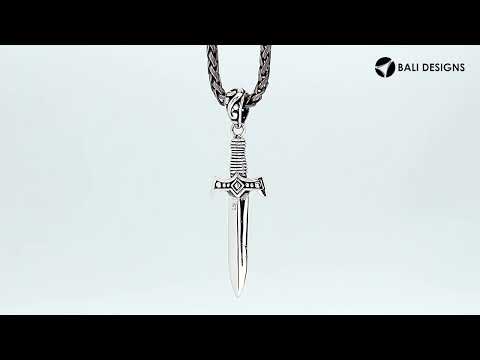 Sterling silver sword pendant with Black Onyx center and Balinese oxidized detailing.