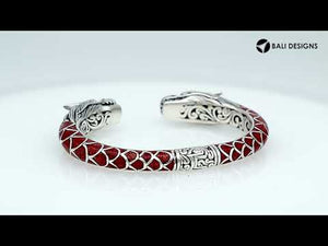 Wholesale sterling silver phoenix-inspired bangle featuring Red Coral accents, ornate Balinese scroll engraving, and a sturdy hinge lock for detailed, artisan-quality wholesale jewelry collections.