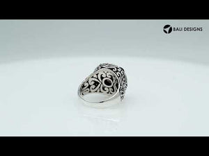Sterling silver wholesale ring with smoky quartz center and smoky quartzsmoky quartz accents, handcrafted with ornate Balinese scrollwork design.
