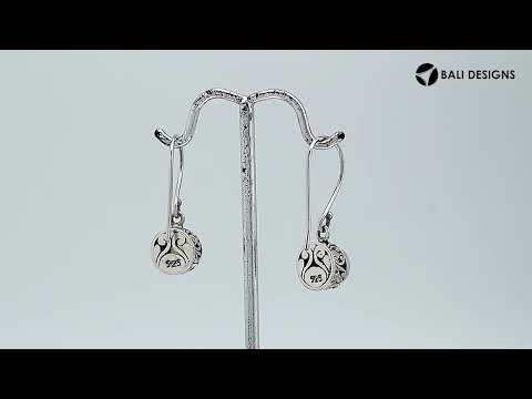 Sterling Silver Peridot round earrings handcrafted in Bali with detailed Balinese carvings and a polished finish.