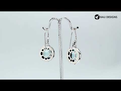 Wholesale sterling silver earrings with round Blue Topaz Quartz and sculpted metal detailing.