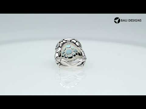 Wholesale sterling silver ring with round-cut Blue Topaz Quartz in a bold Balinese bezel design.