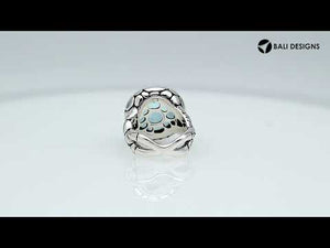 Wholesale sterling silver ring with round-cut Blue Topaz Quartz in a bold Balinese bezel design.