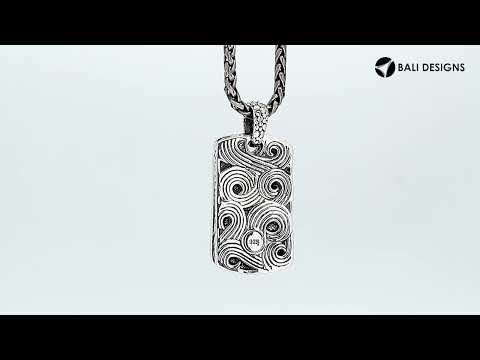 Wholesale sterling silver rectangle pendant with carved swirl pattern.