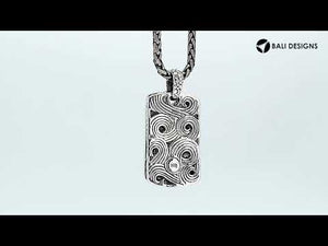 Wholesale sterling silver rectangle pendant with carved swirl pattern.