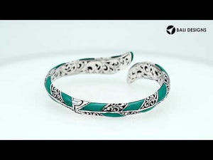 Wholesale sterling silver feather-style bangle featuring Turquoise Shell inlays, ornate Balinese scroll engravings, and a secure hinge lock for premium artisan jewelry assortments.